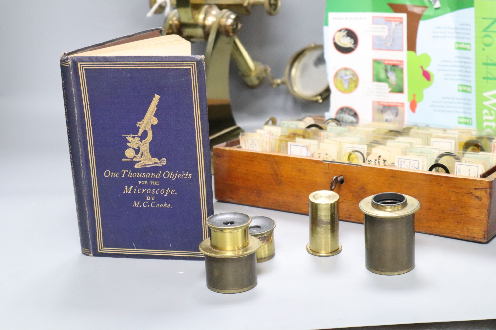 A Hawes of London large brass microscope and box of Victorian and late microscope slides